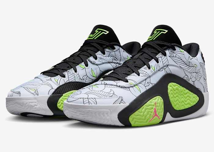 Side view of Jayson Tatum's white, black, and green Jordan Brand sneakers.